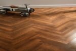 Reflective Ridge Laminate Flooring Oak Brown