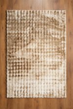 Beige shaggy rug with soft fluffy pile by Musa Carpets