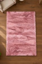 Pink shaggy rug displayed in a modern living room