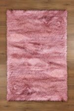 Pink shaggy rug with soft fluffy pile by Musa Carpets