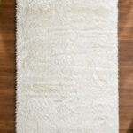 White fluffy shaggy rug for modern bedroom and living room décor