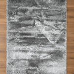 Grey shaggy rug displayed in a modern living room