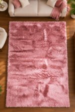 Pink shaggy rug displayed in a modern living room
