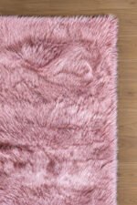 pink shaggy area rug viewed from another angle