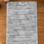 Grey shaggy rug displayed in a modern living room