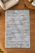 Grey shaggy rug displayed in a modern living room