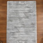 Grey shaggy rug displayed in a modern living room