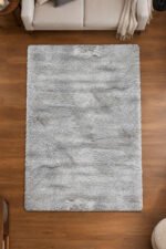 Grey shaggy rug displayed in a modern living room