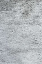 Grey shaggy rug with fluffy long pile for modern home décor