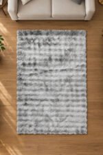 Grey shaggy rug displayed in a modern living room