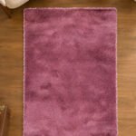 Pink shaggy rug displayed in a modern living room