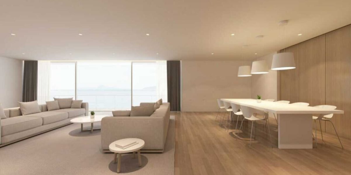 Perspective of modern luxury living room with white sofa and dining table on sea view background,Idea of family vacation - warm timber interior design - 3D rendering.